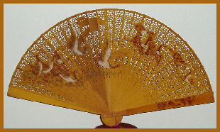 Sandalwood fan with traditional flying birds motif