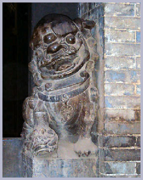 Lion guarding entrance to the house at the Qiao Family compound outside Zhengzhou