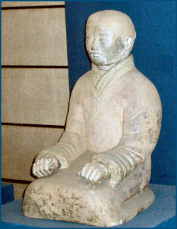 Small clay figure, man kneeling, Shaanxi Museum